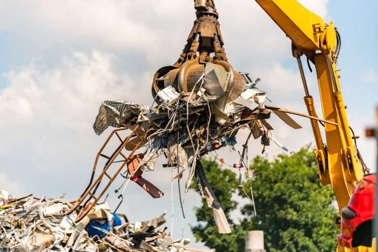 close up of a crane for recycling metallic waste
